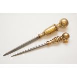 Two brass handled shank knives