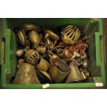 A box of brass bells including elephant bells