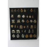 A collection of 40 various Cavalry Regiment badges including some later retrospective copies