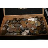 A wooden cigar box containing mixed coinage including Irish, Australian, Canadian etc,