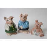 Three Wade Natwest piggy banks comprising Woody the baby,