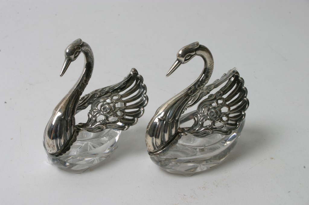 A further pair of swan shaped  glass and silver salts with star cut bases