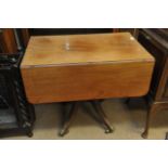 A 19th century mahogany breakfast table with twin flaps on a pedestal and four splayed legs