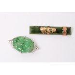 A 9ct white gold mounted jade brooch and one other gold mounted brooch (2)
