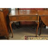 A reproduction Queen Anne style quarter veneer console table
