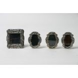 A collection of four silver miniature  photo frames