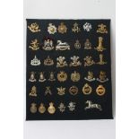 A collection of 37 various British cavalry badges including some retrospective copies