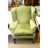 A George III style wing arm chair with green draylon upholstered and square legs united by