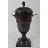 An impressive large Art Deco bronzed metal trophy of urn shape with banded decoration,