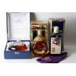 Three boxed bottles of Scotch whisky comprising a limited edition bottle of De Luxe twelve years