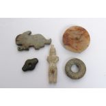 A collection of assorted Chinese stone carvings of varying deisgn including archaic style mythical