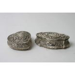 Two silver repousse decorated trinket boxes, one heart shaped,