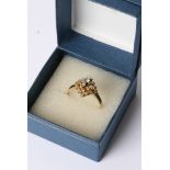 An 18ct gold ring inset with a diamond
