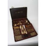 A gold plated Bestecke Solingen part cutlery set marked 23/24 karat in fitted attache case.