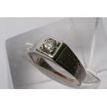 A 9ct white gold ring inset with a CZ stone