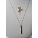 withdrawn - A 9ct gold and diamond pendant with a gold chain and a stick pin in the form of tennis