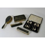 Three tortoise shell backed hair brushes,