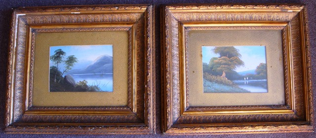 Scottish School. Pair of Victorian loch landscape oils in gilt and gesso frames.