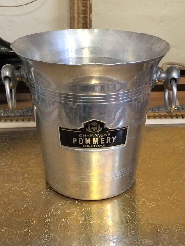 Pommery, vintage Champagne ice bucket, with two handles.