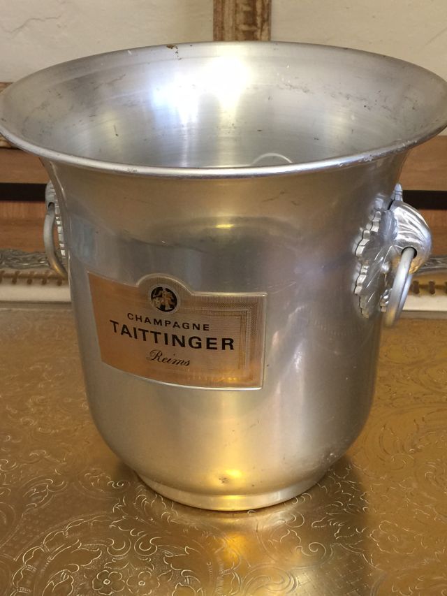 Taittinger, vintage Champagne ice bucket, with two handles with vine leaf mouldings.