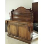 Mahogany chiffonier, late 19th/early 20thC, single curved front drawer over two-door cupboard with