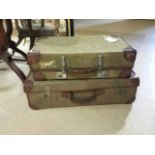 Pair vintage suitcases in canvas and leather. One is approx 70 x 40 cm, other 62 x 39 cm