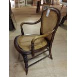 19th century nursing chair with bergere back and seat. 80 cm high at back, 52 cm widest point of
