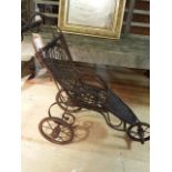 Child or dolls antique invalid chair, stands 66 cm high
