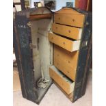 Gentleman's travelling wardrobe trunk, having various drawer compartments. Overall 136 cm high