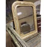 Gilt framed French mirror showing some losses to frame. Overall 61 x 48.5 cm