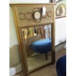 Trumeau French mirror, gilt frame, young child's face encased within, frame 73.5 x 118 cm