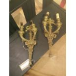 Pair of early/mid 20th century brass wall lights, twin arm, ribbon surmount, rose decoration: 48cm