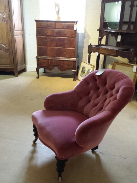 Victorian nursing chair in pink upholstery, button backed on turned supports and original castors. - Image 6 of 7