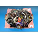 A large collection of bangles and bracel