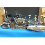 A large collection of plated and metal w