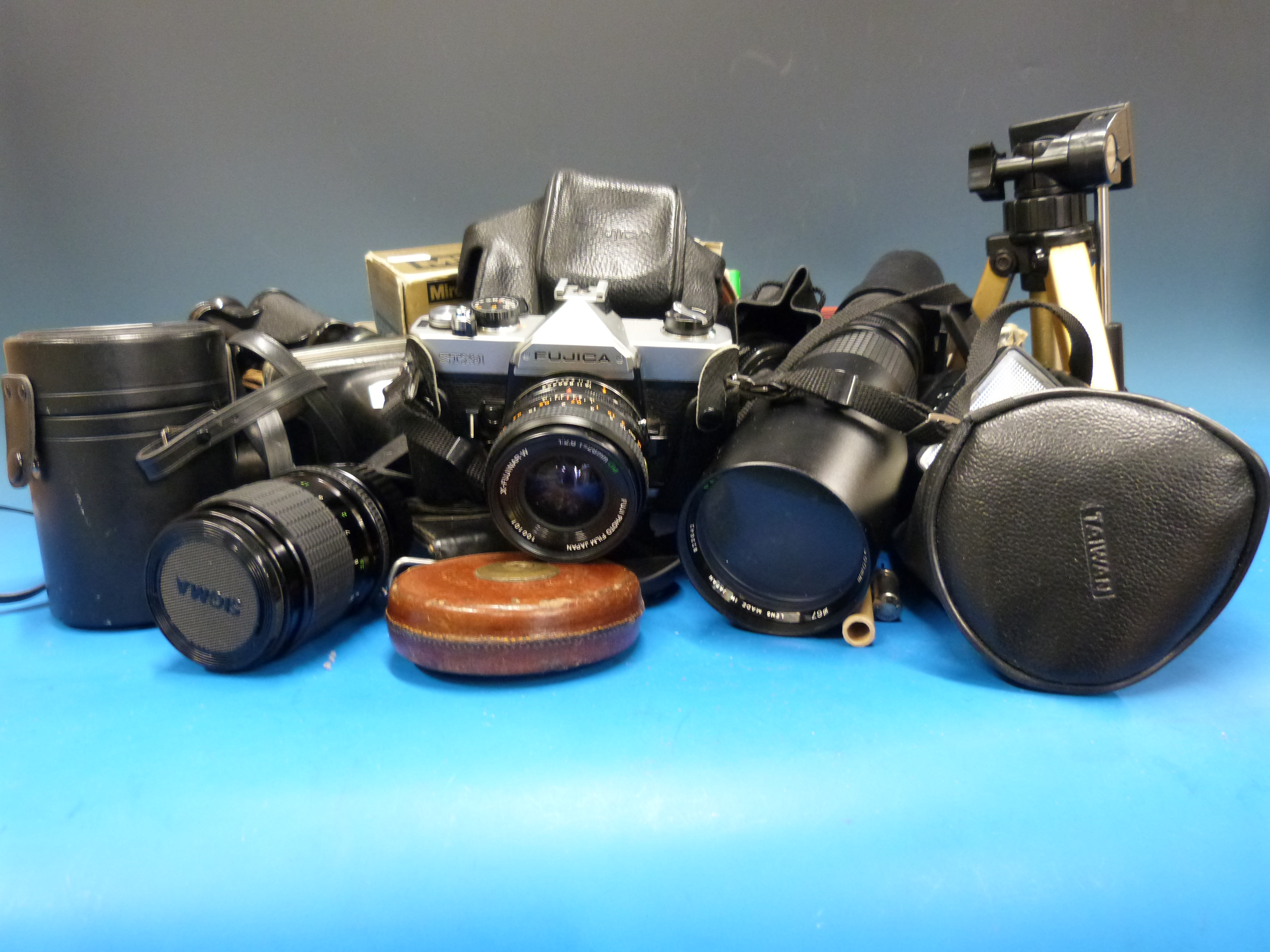 Collection of cameras, lenses and binocu