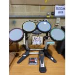 A Playstation drum set together with Res