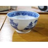 A Chinese blue and white teabowl decorat