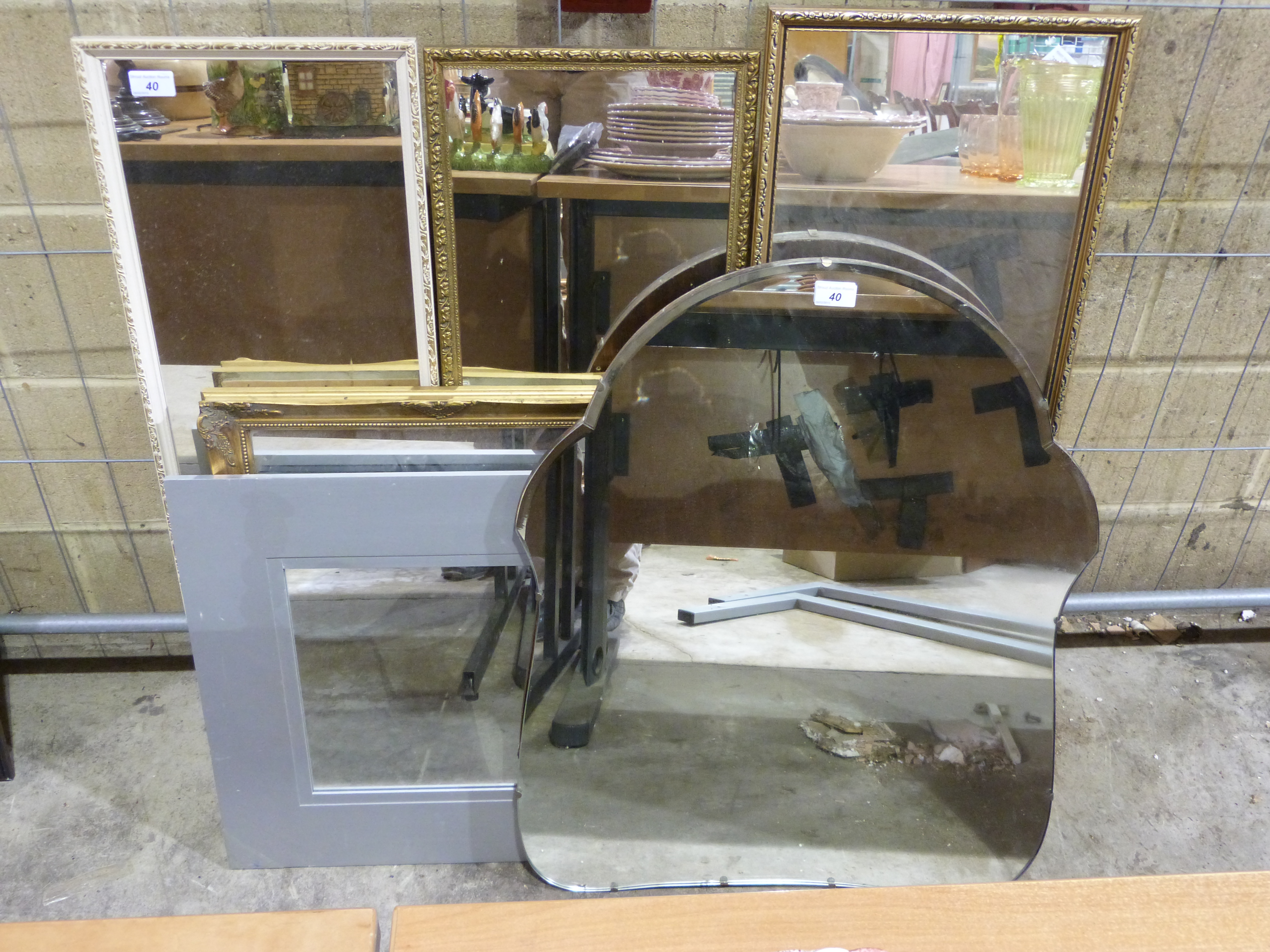 A collection of various sized mirrors