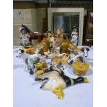 A collection of ceramic animals includin