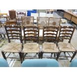 A set of four ladder back rush seated di