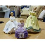 Three various Royal Doulton figurines co