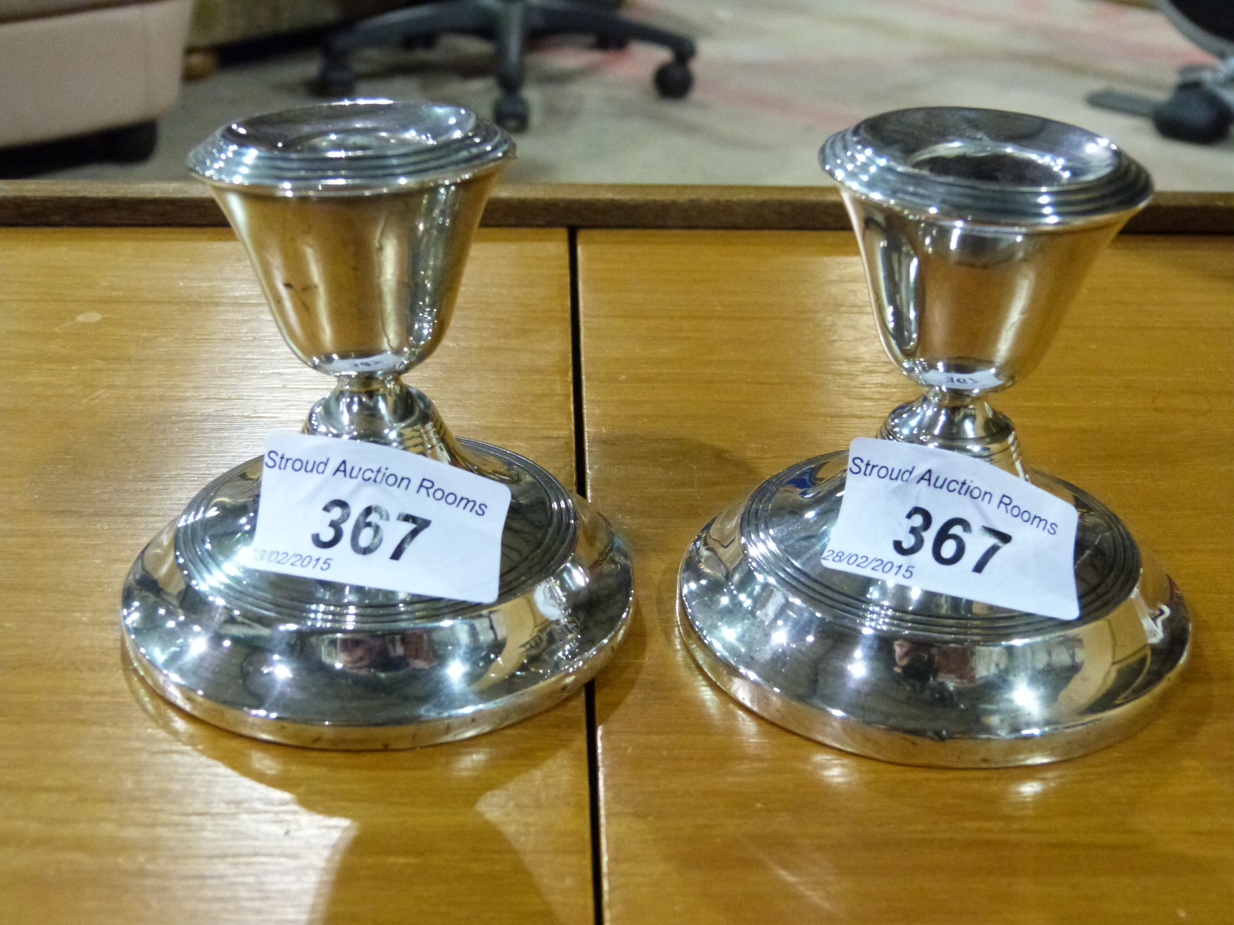 A pair of hallmarked silver dwarf candle