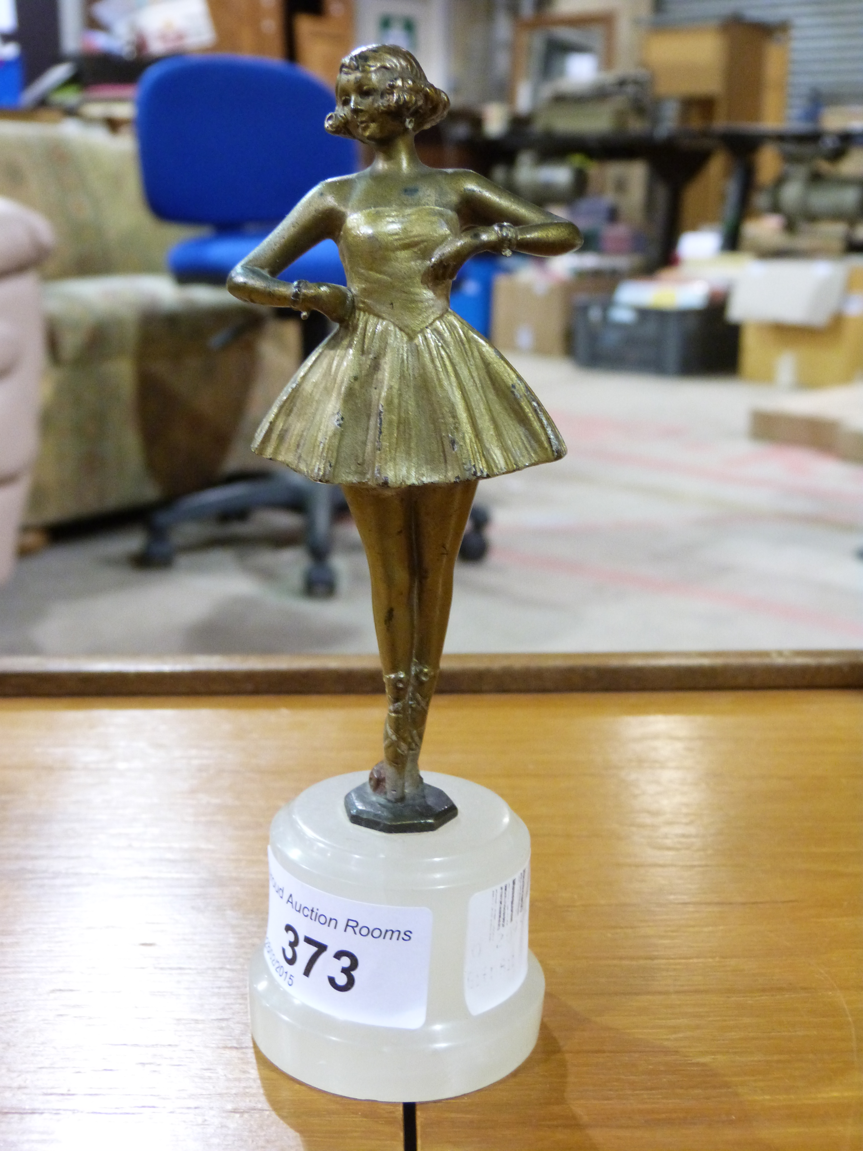 An Art Deco figure of a ballerina on mar