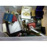 A box of collectables and costume jewell