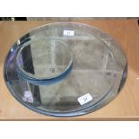 A selection of circular bevelled mirrors