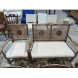 An oak bergere two seater sofa together