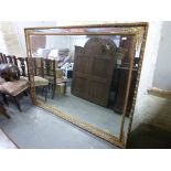 A very large mirror with ormolu style fr