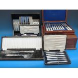 A quantity of cased cutlery including ha