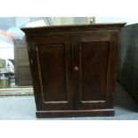 A 19th century cupboard with panelled cu